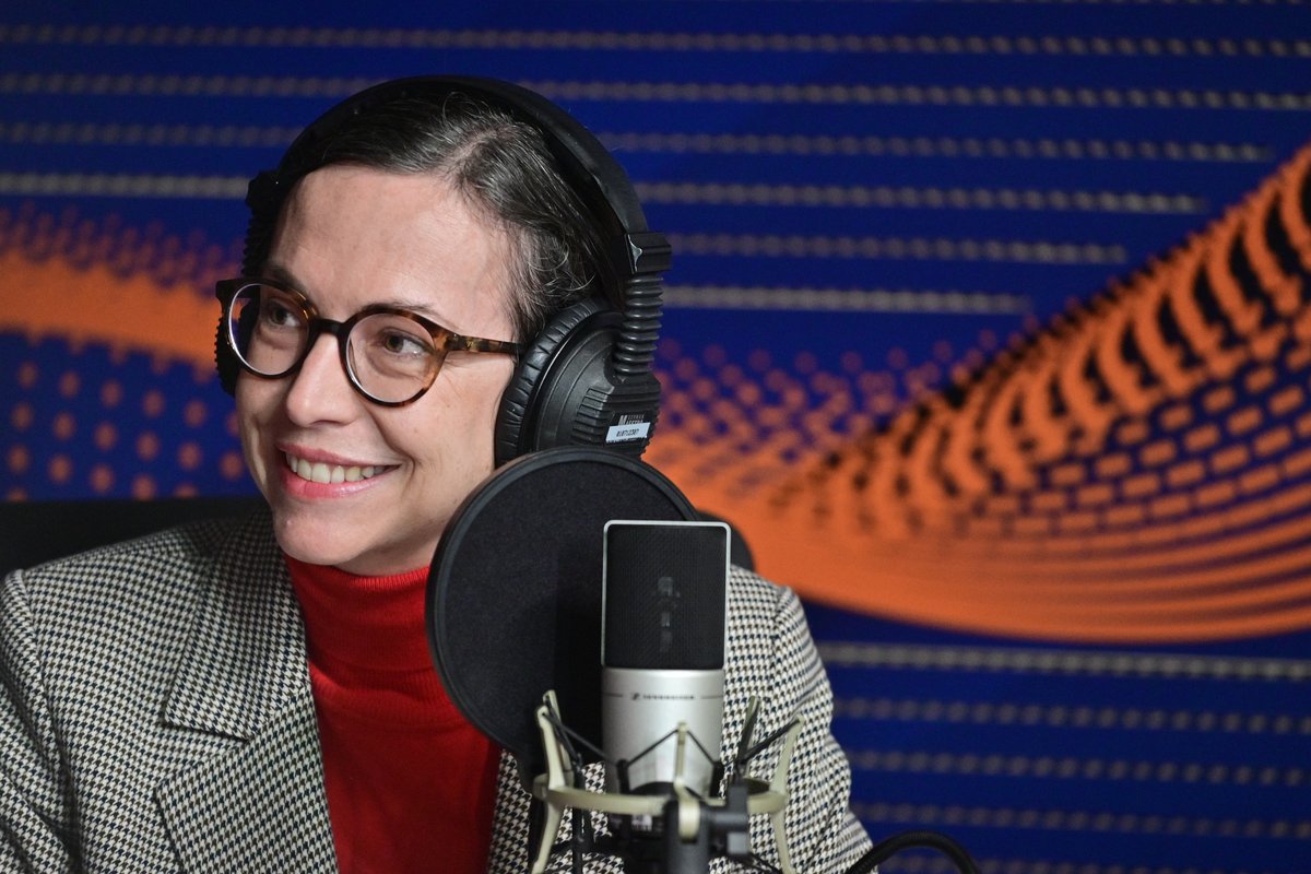 Adriana Martínez-Villalba García, Director of the National Library of Colombia, speaking at a radio interview in 2023