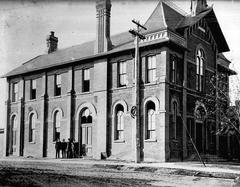 Historic public library building at Yonge Street and Montgomery Avenue in early 1900s Toronto