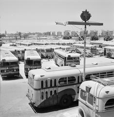 Black and white photo showing buses parked in a bus depot in Tel Aviv on the Sabbath in 1964