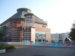 Main gate of Osaka Prefecture University at Habikino with modern architecture and greenery