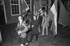 Black and white photo of the congregation of English Reformde Church on Begijnenhof in procession to New Side Chapel due to closure of the church at Begijnenhof, dated November 6, 1974