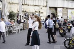 2015 street scene in Tel Aviv-Yafo with modern buildings and cars