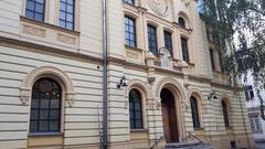 Exterior view of Nożyk Synagogue in Warsaw with blue sky