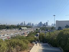 View of Tel Aviv University Railway Station with cityscape in the background