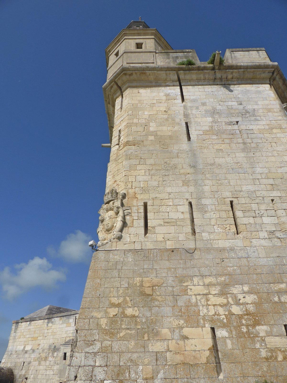 Bourcefranc Fort Louvois Donjon with royal coat of arms, four levels of arrow slits, and lantern tower in 2024