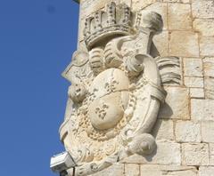 Sculpted royal coat of arms on the tower near the entrance of Fort Louvois