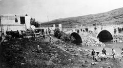 Group of students from Herzliya Gymnasium on a 1932 Passover trip with educator Ben Yehuda near Bnot Yaakov Bridge