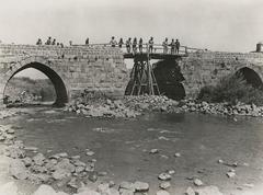 Soldiers and civilians on the damaged Jisr Benat Yakub bridge over the River Jordan, 1918