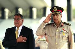 Secretary of Defense Leon Panetta beside Egyptian Maj. Gen. Rouini at Tomb of the Unknown Soldier and President Anwar Sadat's memorial in Cairo