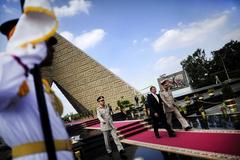 U.S. Defense Secretary Leon E. Panetta and Egyptian Maj. Gen. Rouini laying wreath at Tomb of the Unknown Soldier and President Anwar Sadat's memorial in Cairo