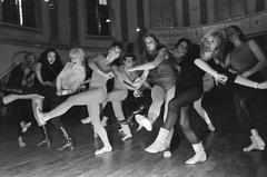 Vintage black and white photo of a movement class with people practicing beat and jazz rhythms led by Henk Le Clerq at Felix Meritis in Amsterdam, September 1967