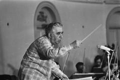 Composer Aram Khachaturian conducting the Amsterdam Philharmonic Orchestra during a rehearsal at Felix Meritis in Amsterdam on September 29, 1971