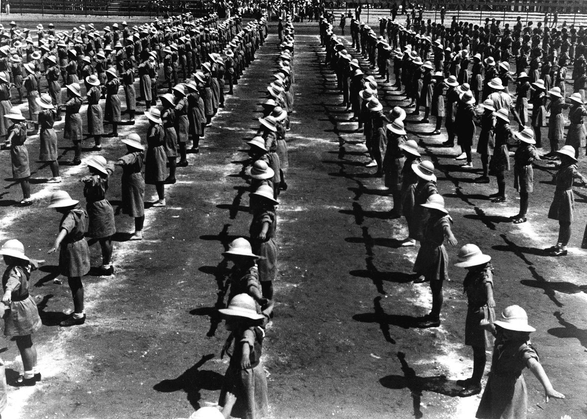 1935 Maccabiah Games opening ceremony crowd with flags and athletes