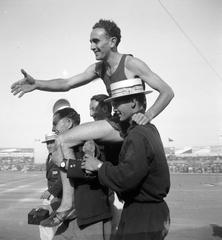 Athlete being carried at 2nd Maccabiah Games stadium