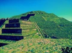 Aerial view of the ancient city of Teotihuacán showing the Pyramid of the Sun and Pyramid of the Moon surrounded by urban landscape
