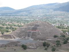 Aerial view of the ancient Mesoamerican city of Teotihuacan with pyramids and residential structures under a clear sky in June 2007