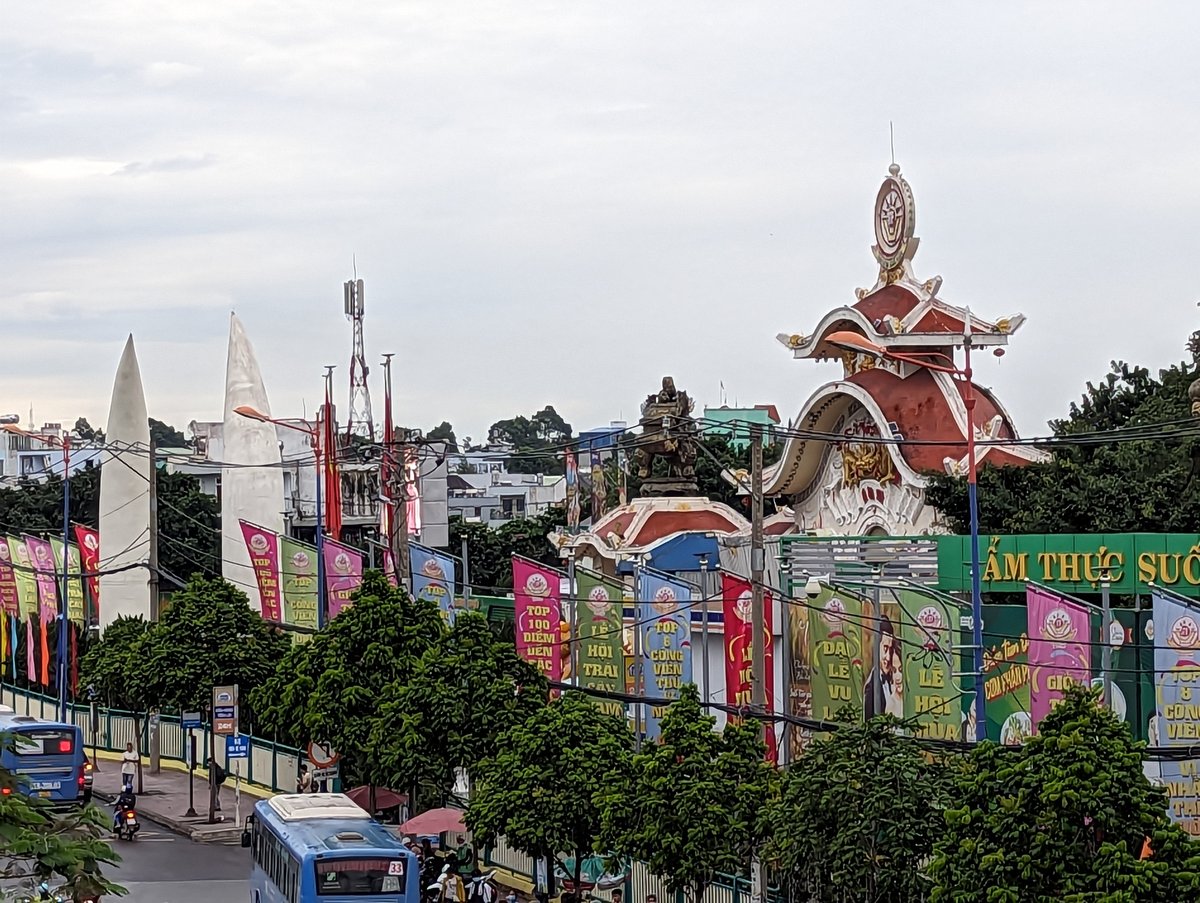 Main entrance of Suoi Tien Park with decorative sculptures and colorful architecture