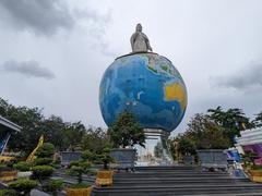 A panoramic view of Suoi Tien Park in July 2023 showcasing lush greenery, pathways, and visitors enjoying the park