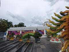 Scenic lake view at Suoi Tien Park in July 2023 with lush greenery and calm water