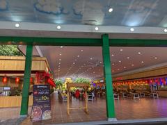 Entrance view of Suoi Tien Park in July 2023 with vibrant decorations and statues