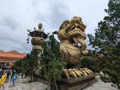 Suoi Tien Park entrance with dragon sculpture in July 2023
