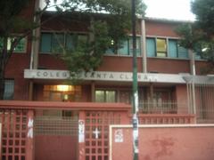 Front view of Colegio building with clear blue sky