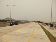 Panoramic view of Costanera Sur waterfront in Asunción, Paraguay with Cerro Lambaré in the background