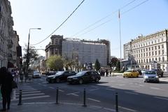 Calea Victoriei street in Bucharest with historic buildings and traffic in April 2018