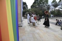 LGBTIQ+ Pride event at Casa de Nariño with rainbow flags and diverse crowd