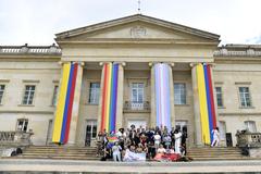 LGBTIQ+ pride celebration at Casa de Nariño with colorful flags and crowd