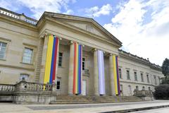 Casa de Nariño building decorated with multiple LGBTIQ+ flags in celebration