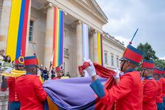 LGBTIQ+ pride celebration at Casa de Nariño with colorful flags and vibrant crowd