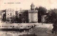 View of Le Castillet and Pont Magenta in Perpignan with clear blue sky