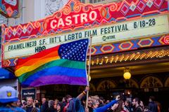 Love Wins celebration in the Castro neighborhood of San Francisco on June 26 2015 with rainbow flags and festive crowd