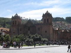 Main cathedral in Cusco with colonial architecture under a blue sky