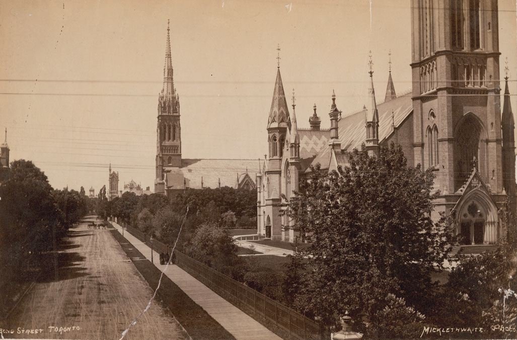 Bond Street in Toronto looking north from above Queen Street featuring Metropolitan Methodist Church and St. Michael's Cathedral