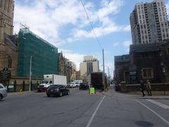 North side of Shuter Street at Bond Street with buildings and pedestrians