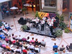 Crowded indoor venue with a performing jazz band at Ottawa Jazz Festival inside Rideau Centre