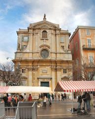 Panoramic view of Le Cours Saleya market in Nice with colorful buildings and bustling street market