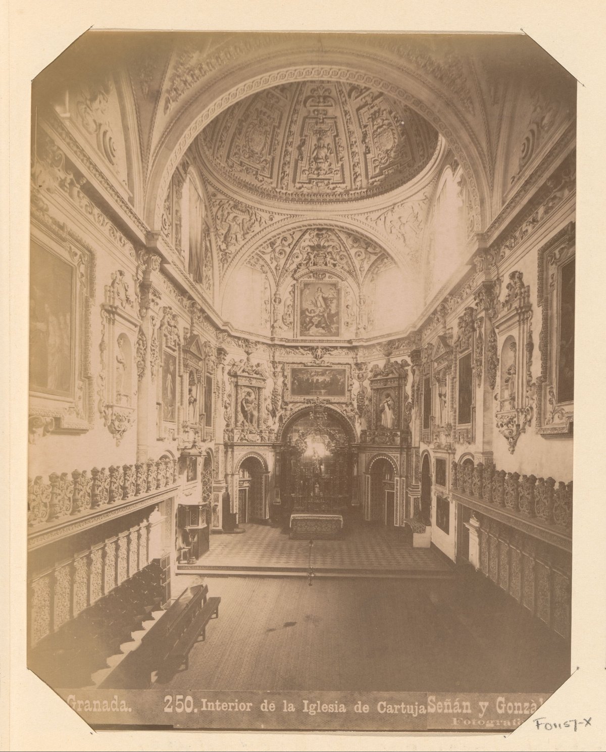 Interior of the Real Monasterio de La Cartuja church in Granada with ornate architecture and religious decorations