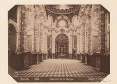 Interior of the sacristy at Real Monasterio de La Cartuja in Granada with ornate religious furnishings and architectural details