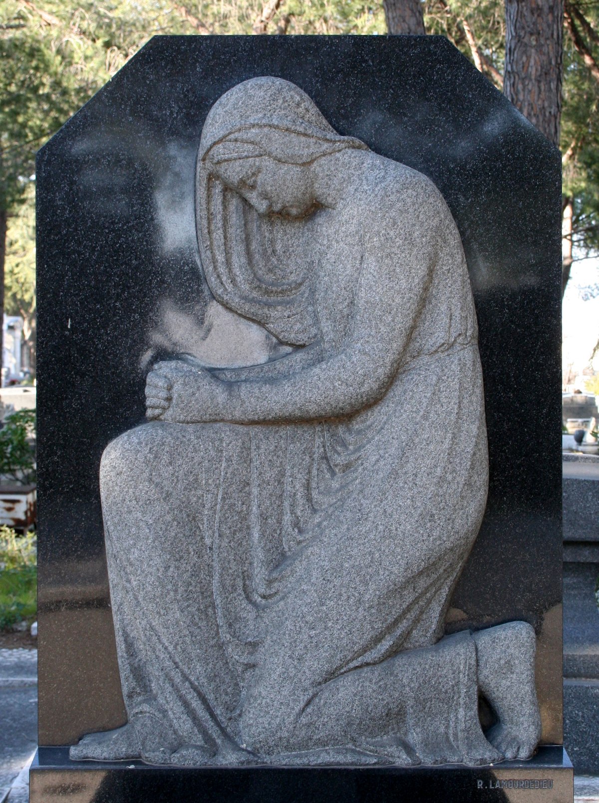 Raoul Lamourdedieu sculpture at Saint Pierre Cemetery in Marseille