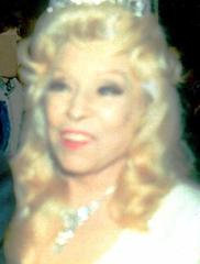Mae West arriving in her diamonds for the opening of her last film at Cinerama Dome, Los Angeles