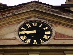Clock in the tympanum of Invalidovna building in Prague