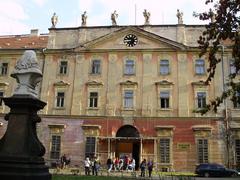 Exterior view of Invalidovna building in Prague, historic baroque architecture with large windows and ornate facade