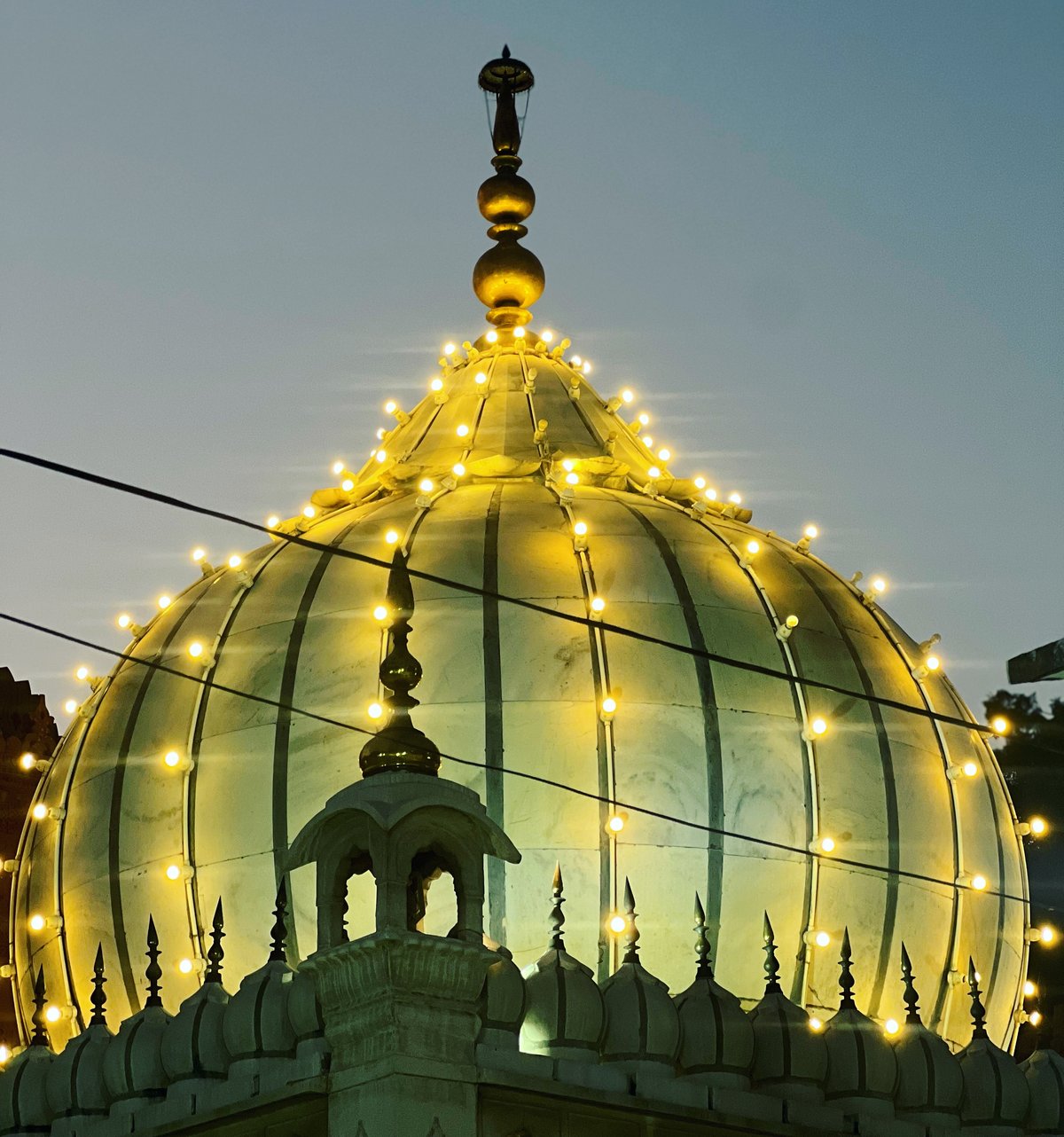 Dome of Dargah Hazrat Nizamuddin Auliya illuminated with lightning during annual urs celebration