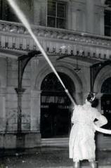Firefighter battling a fire at Estação da Luz in 1946