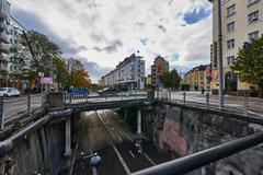 Baana cycling and pedestrian path in Helsinki with modern buildings and street lights