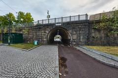 Baana pedestrian and bicycle path in Helsinki with greenery and people walking and cycling