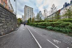 Baana pedestrian and bike path with modern urban surroundings in Helsinki